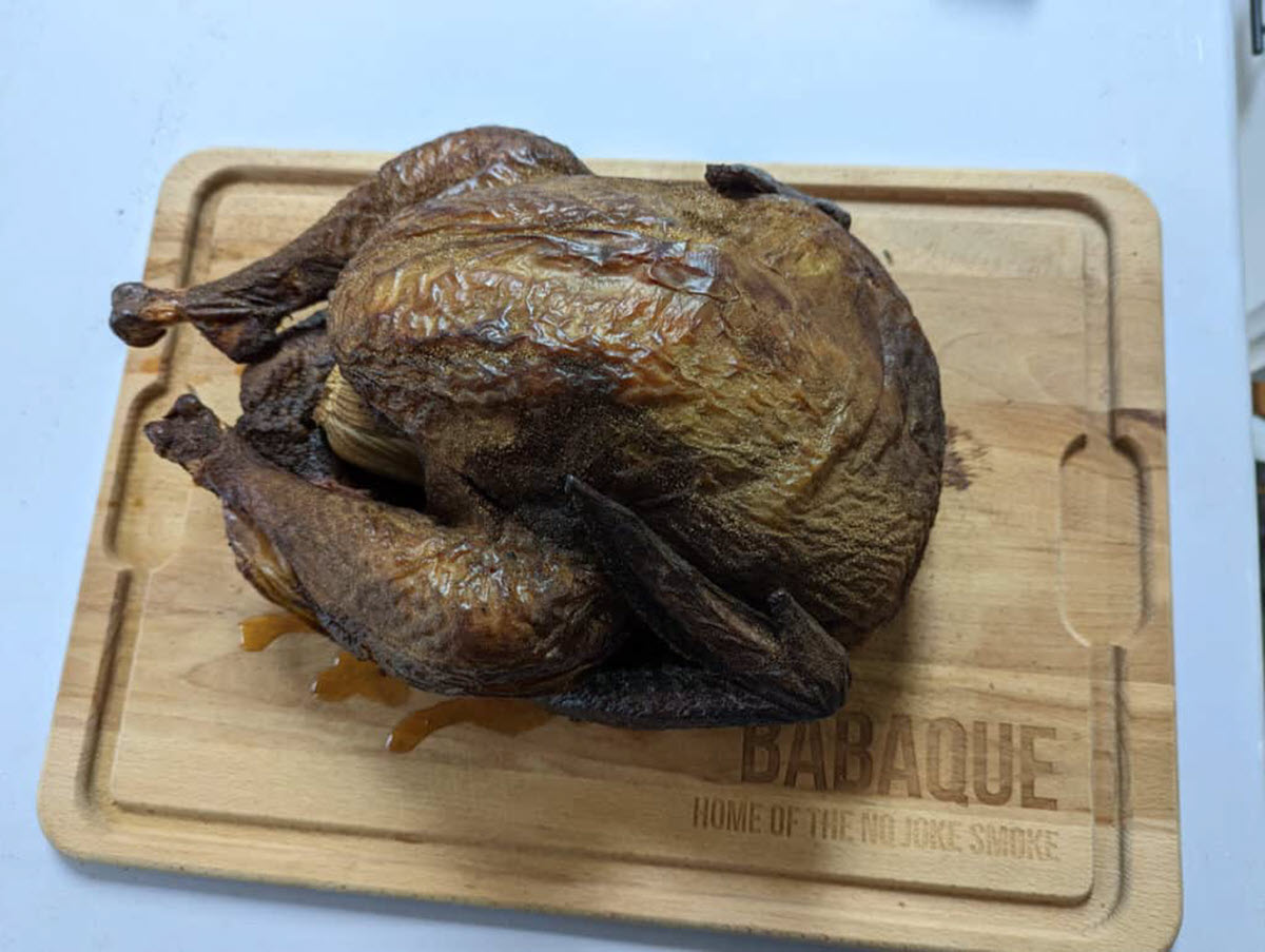 Smoked turkey on cutting board